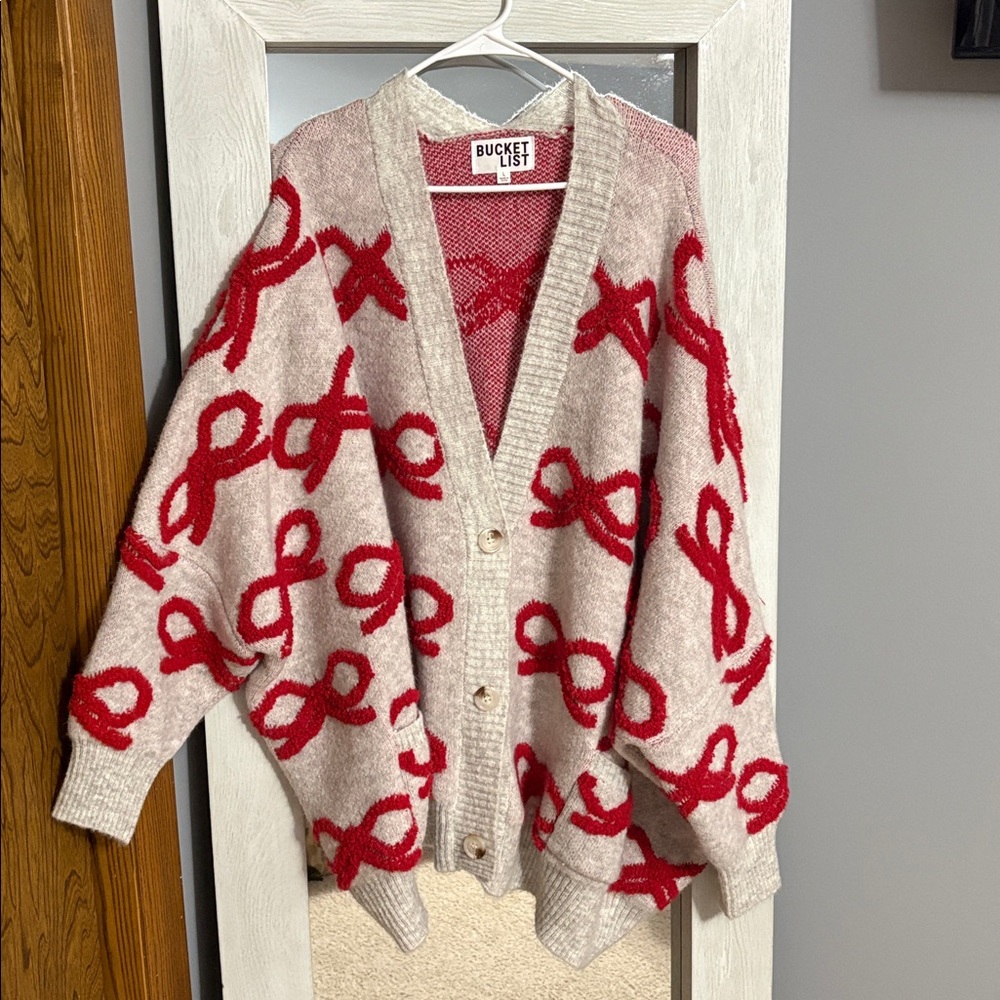 Oversized red and gray bow sweater